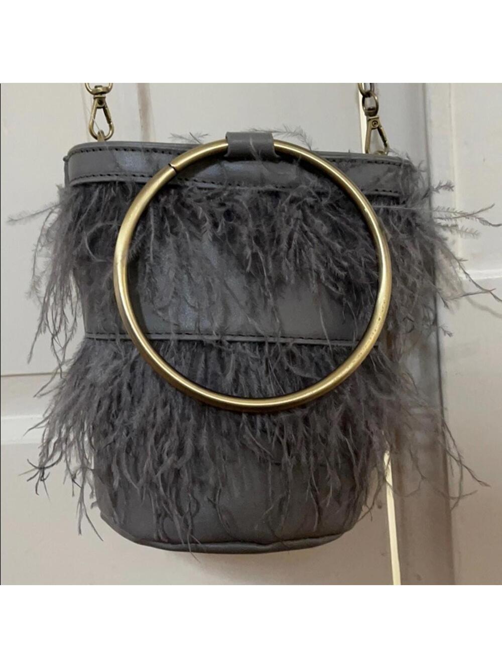 Gray mini bucket crossbody w bangle handles and feathers